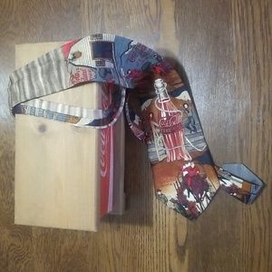 Vintage Coca Cola necktie with wooden Coca cola box.